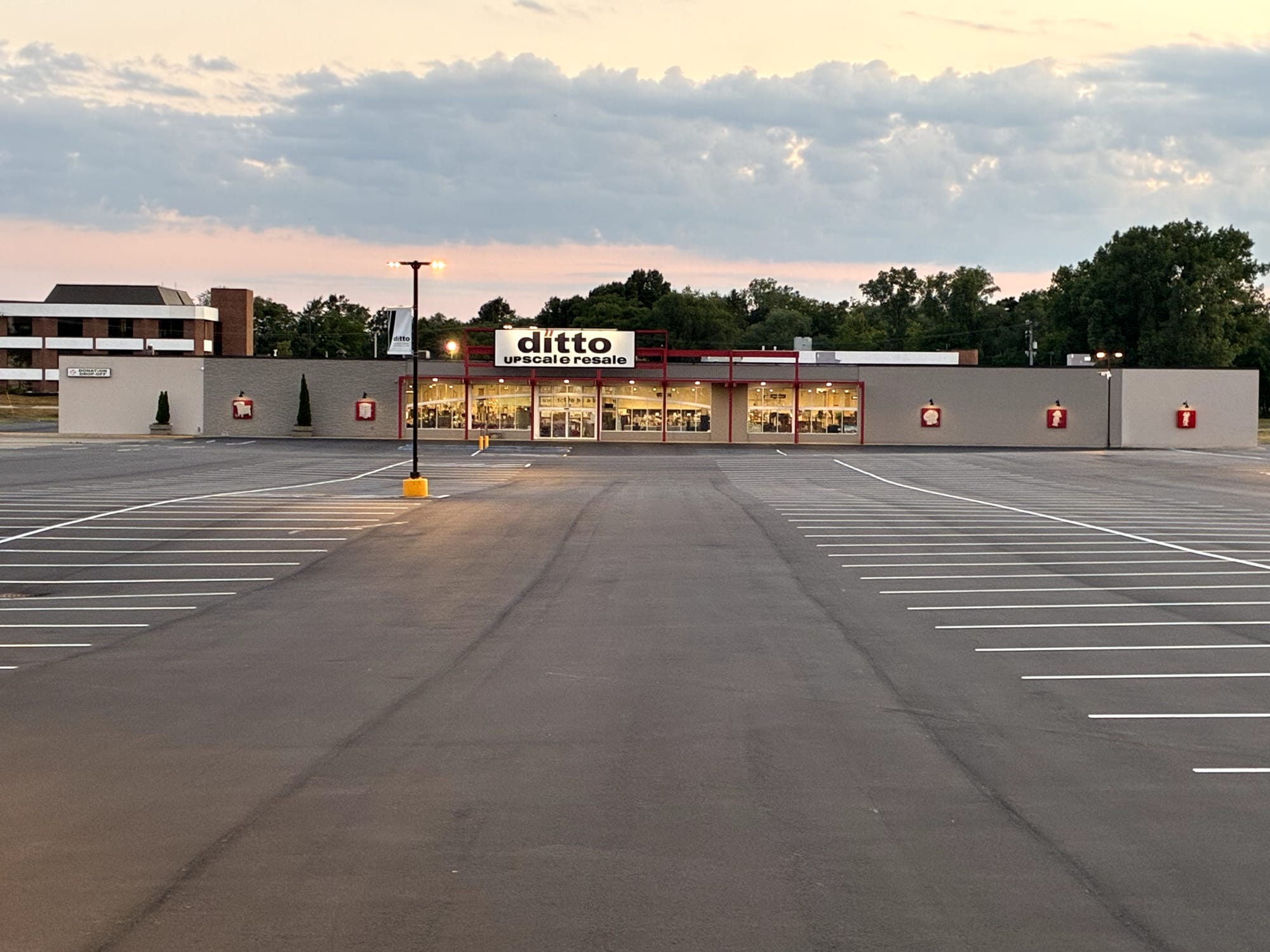 ditto upscale resale storefront in Holland, Michigan at dusk